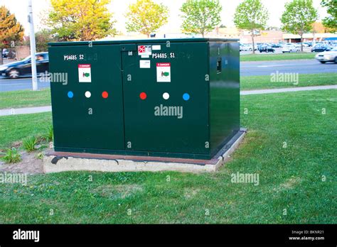 green electric box outside|green electrical box in street.